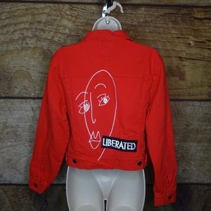 RED DENIM JACKET WITH EMBROIDERED PRINT ON BACK